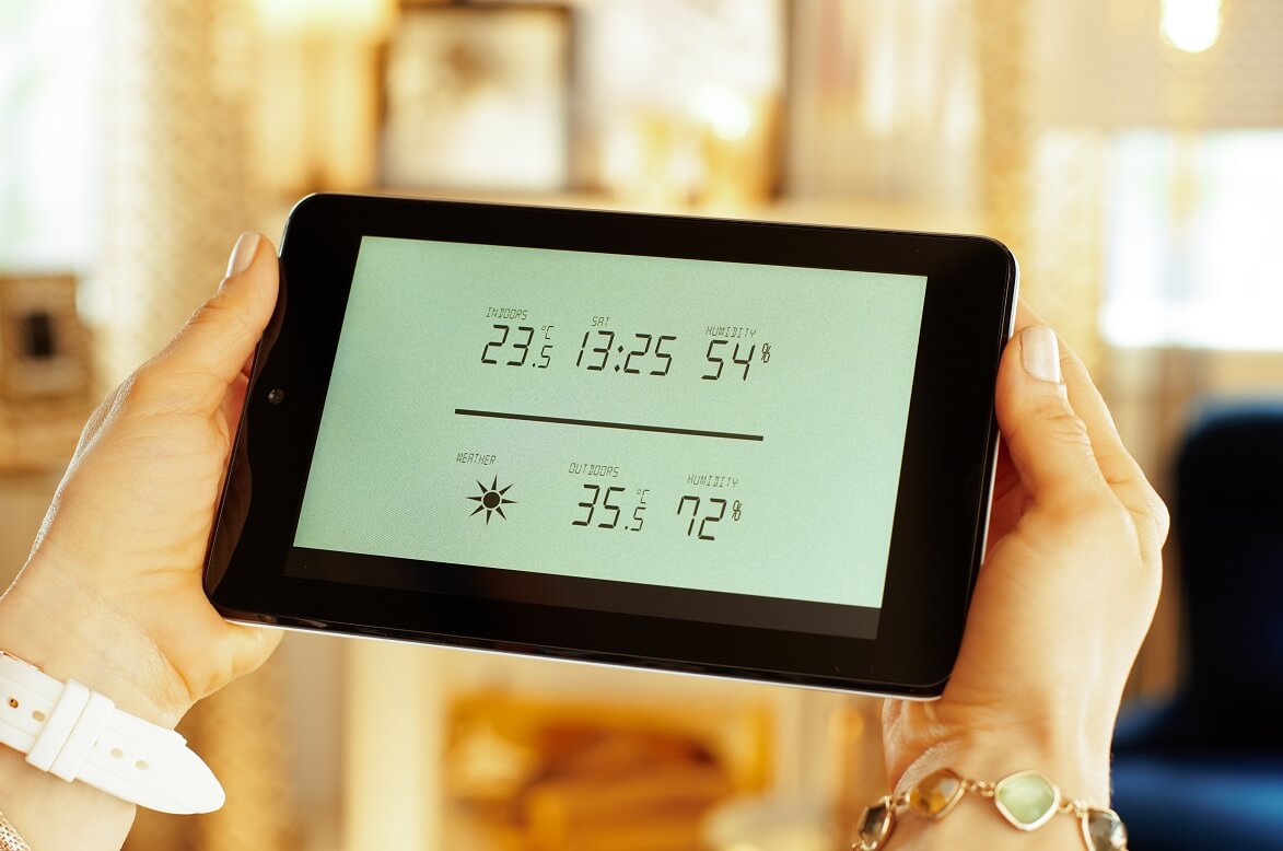 tablette permettant de contrôler à distance le système de chauffage