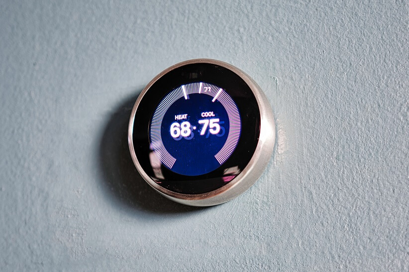 thermostat placé au mur